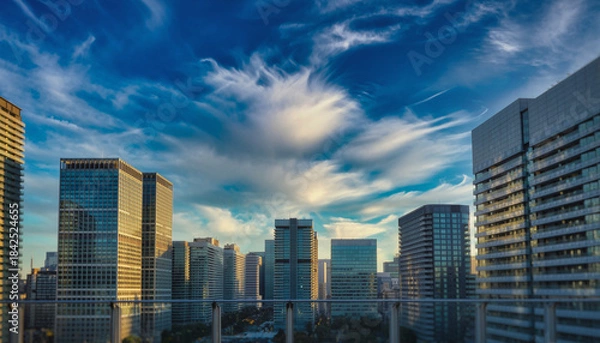Obraz 青空に映える日本の高層オフィスビル群の都市風景