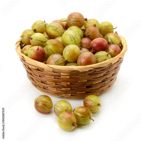 Obraz Juicy Green and Red Gooseberries in Woven Basket Shot in Studio with White Background