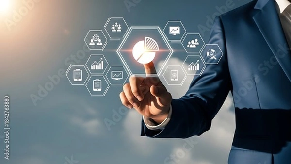 Fototapeta Businessman holding a glowing light bulb with futuristic digital icons floating around it in a professional setting with a blurred background