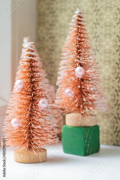 Fototapeta Soft focus Christmas background with red toy Christmas tree, vertical frame