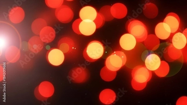 Fototapeta Abstract bokeh background of glowing red and yellow circular lights with lens flare effect