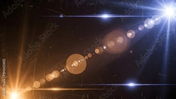 Fototapeta A mesmerizing display of opposing orange and blue light flares against a dark, textured backdrop