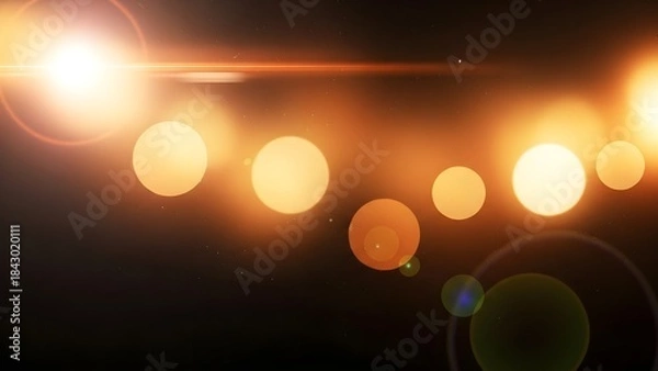 Fototapeta A dynamic display of glowing orbs and lens flare effects in a dark, abstract space environment