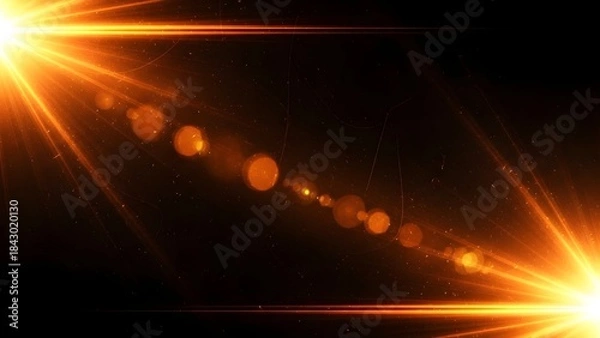 Fototapeta Dynamic orange and yellow lens flare effect with brilliant light rays and bokeh