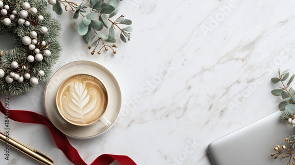 Obraz Minimalist Christmas home office setup with laptop, ceramic cup and white berry wreath arranged in grid pattern from above