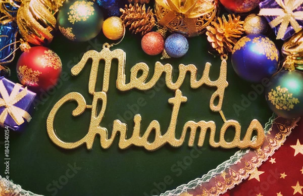 Obraz メリークリスマスの文字プレート　クリスマスオーナメントの背景装飾　パーティー