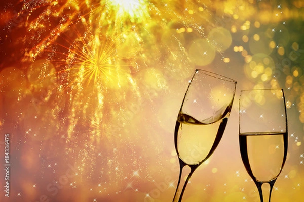 Fototapeta Champagne glasses on sparkling background