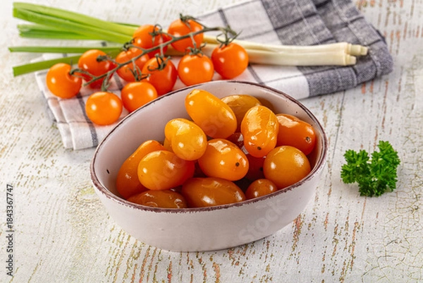 Obraz Marinated yellow cherry tomatoes heap
