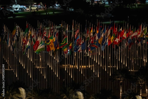 Fototapeta Doha, Qatar - October 9, 2025: The Flag Plaza, displays 119 flags from countries with authorized diplomatic missions, including flags of the European Union, the United Nation and the GCC.
