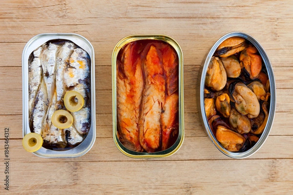 Obraz Three different opened cans of preserved