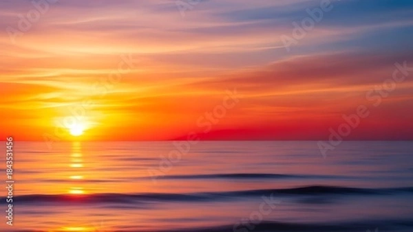 Obraz Serene Sunset over Calm Ocean Waves