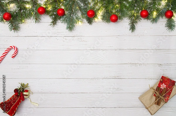 Obraz Christmas flat lay styled scene - frame with evergreen fir tree, decorations and present box