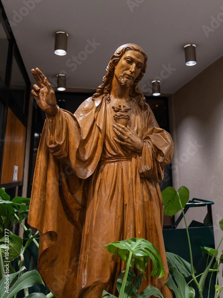 Fototapeta Beautiful Wood Carving of Jesus Christ without a cross but with thorns and the heart. High quality photo