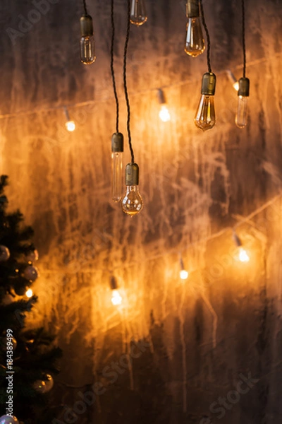 Obraz Christmas tree background, bright hanging lamp, New year.