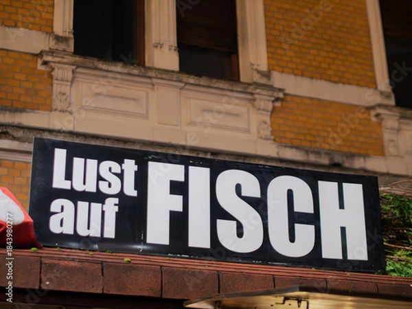 Obraz Delicious Fresh Fish Gourmet Signage in Urban Setting