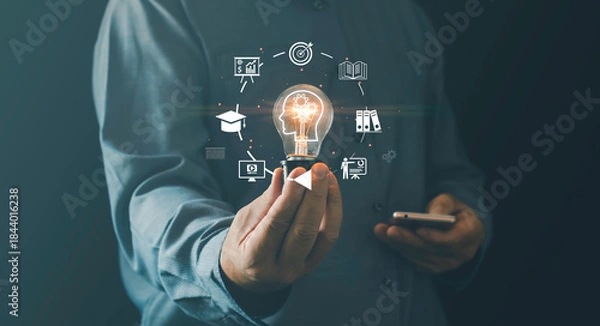 Obraz Innovative learning knowledge-development concept with creative thinking, modern digital education person holding glowing light bulb surrounded icons representing training, e-learning, development