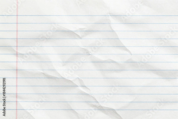 Fototapeta Piece of lined paper with a red line on it.