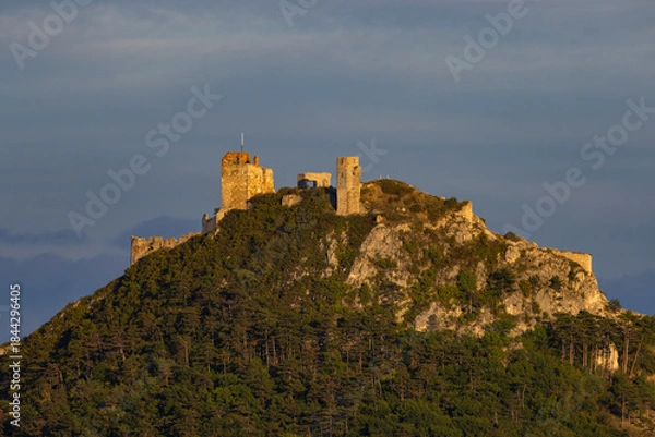 Fototapeta Staatz Castle Ruins on a hill at sunset