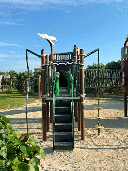 Obraz Modern playground structure with stairs and climbing elements on a sunny day