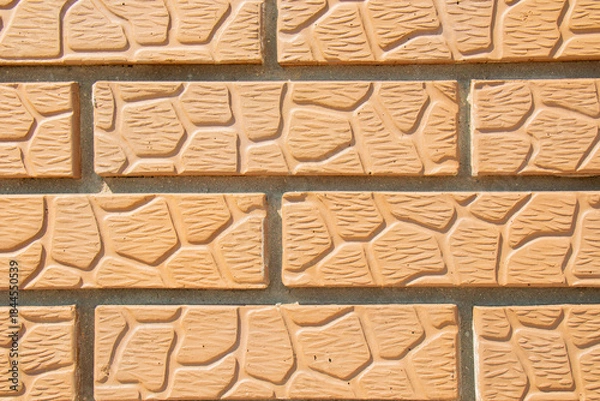 Obraz Textured brick wall. Light orange brick wall.