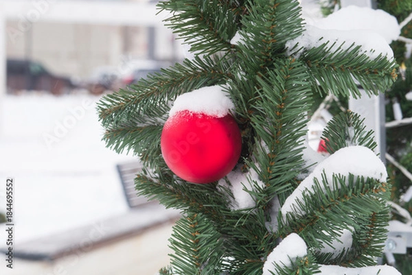 Fototapeta Christmas decorations on the city streets. Christmas baubles.