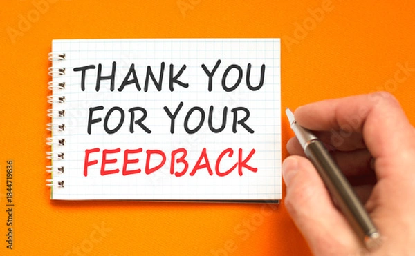 Fototapeta Thank you for your feedback symbol. Concept words Thank you for your feedback on beautiful white note. Beautiful orange paper background. Business thank you for your feedback concept. Copy space.