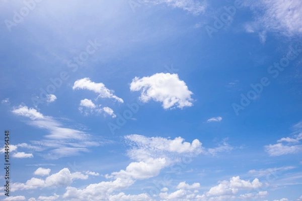 Obraz clear blue sky background,clouds with background, Blue sky background with tiny clouds. White fluffy clouds in the blue sky. 