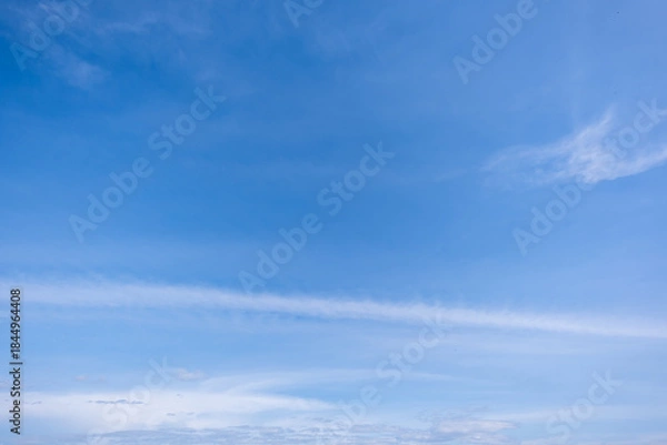 Obraz clear blue sky background,clouds with background, Blue sky background with tiny clouds. White fluffy clouds in the blue sky. 