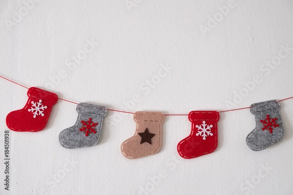 Fototapeta フェルトでできたクリスマスのブーツ