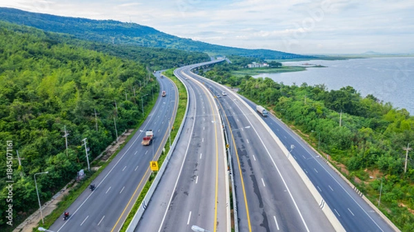 Fototapeta Expressways, motorways, highways, elevated roads, routes passing through mountains and bodies of water or dams offer beautiful scenery.