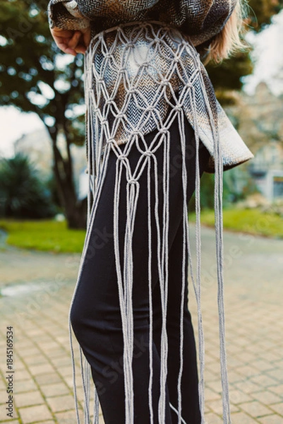 Obraz Creative fashion design showcasing unique macrame details in a vibrant outdoor setting during the afternoon