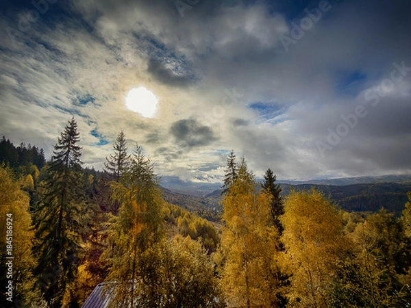 Fototapeta Sunny Autumn Carpathians with Puffy White Clouds