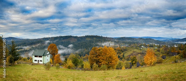 Fototapeta Sunny Autumn Carpathians with Puffy White Clouds
