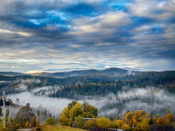 Fototapeta Sunny Autumn Carpathians with Puffy White Clouds