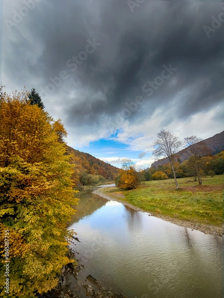 Fototapeta Sunny Autumn Carpathians with Puffy White Clouds