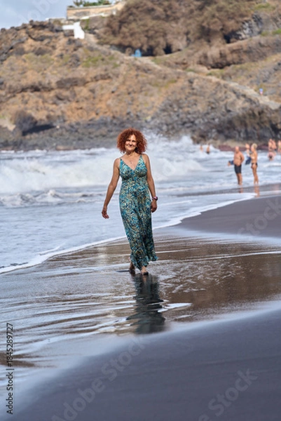 Obraz Woman walking on El Bollullo beach