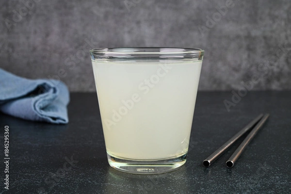 Obraz Lychee juice served in a glass cup.