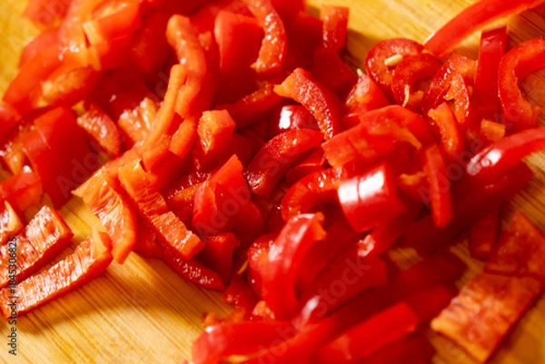 Obraz Chopped Red Bell Pepper on Wooden Cutting Board