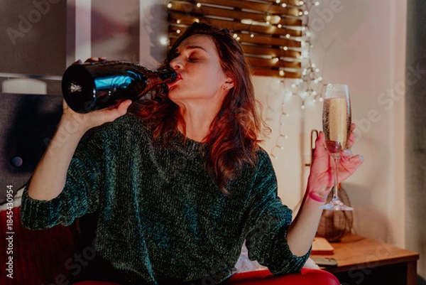 Obraz Young pretty woman drinking champagn during Christmas Holidays retro style photo