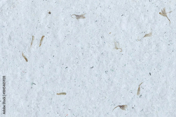 Fototapeta Natural paper mulberry handmade recycled texture background with plant fiber inclusions. White eco friendly art and craft concept