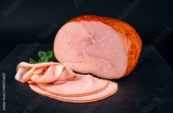 Obraz Traditional Italian prosciutto arrosto rustico - cooked roasted smoked ham hounch meat cut in this slices