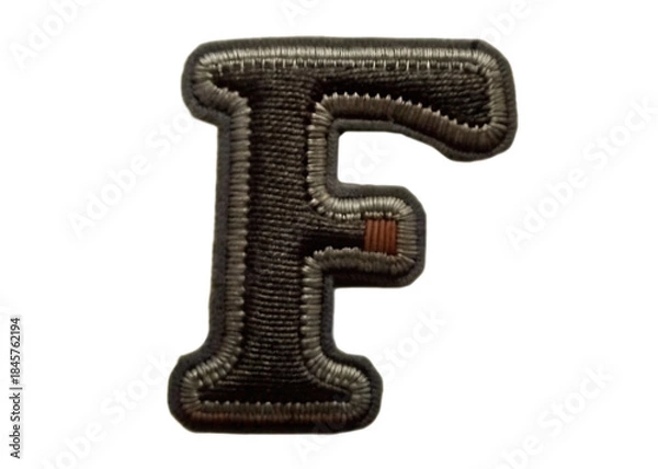 Obraz 3d metallic letter f with textured surface isolated on white background