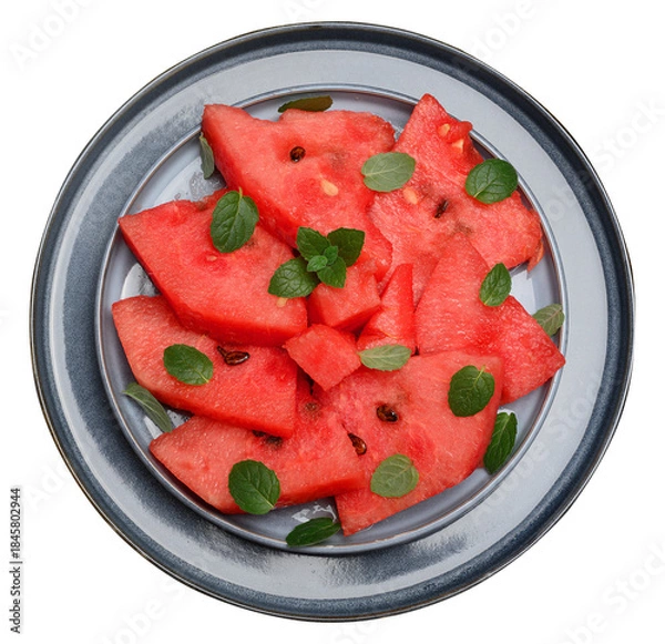 Obraz Round blue plate with sliced ​​watermelon pieces on isolated background, top view