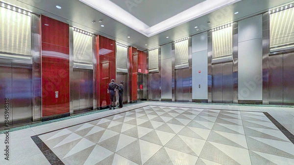 Obraz elevator cabins in a business lobby