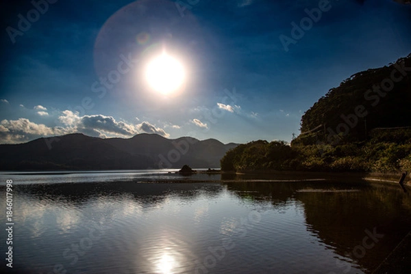 Obraz 奄美大島。穏やかな入江の朝。