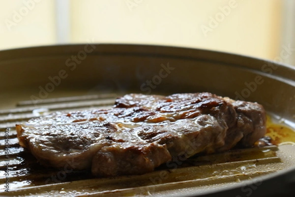 Fototapeta meat steak grill on pan in the kitchen
