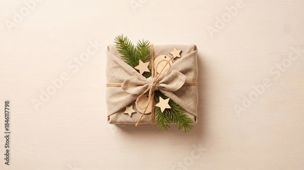 Obraz エコでおしゃれな風呂敷ギフトラッピングの俯瞰フラットレイ自然素材クリスマスプレゼント背景コピースペース-生成AI