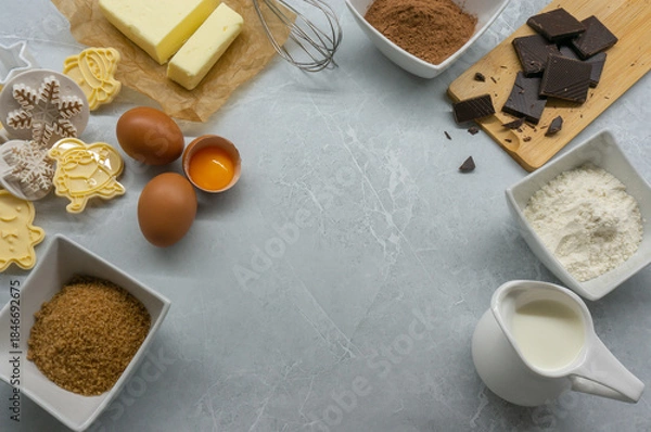 Fototapeta Ingredients for making Christmas cookies. Top view. Space for text.