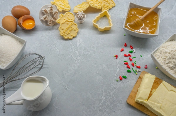 Fototapeta Making Christmas Baking and Sweets. Christmas Cookie Cutters and Ingredients. Space for Text.