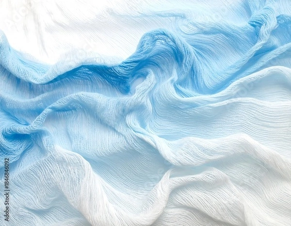 Fototapeta Abstract flowing light blue and white fabric texture with soft ripples and gentle folds creating a serene and ethereal visual